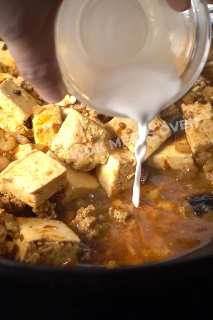 Cornstarch slurry added to mapo tofu