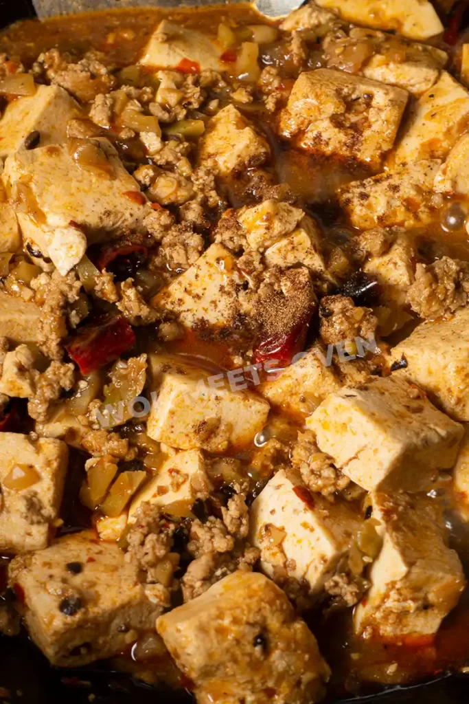 Ground Sichuan peppercorn sprinkled on top of mapo tofu