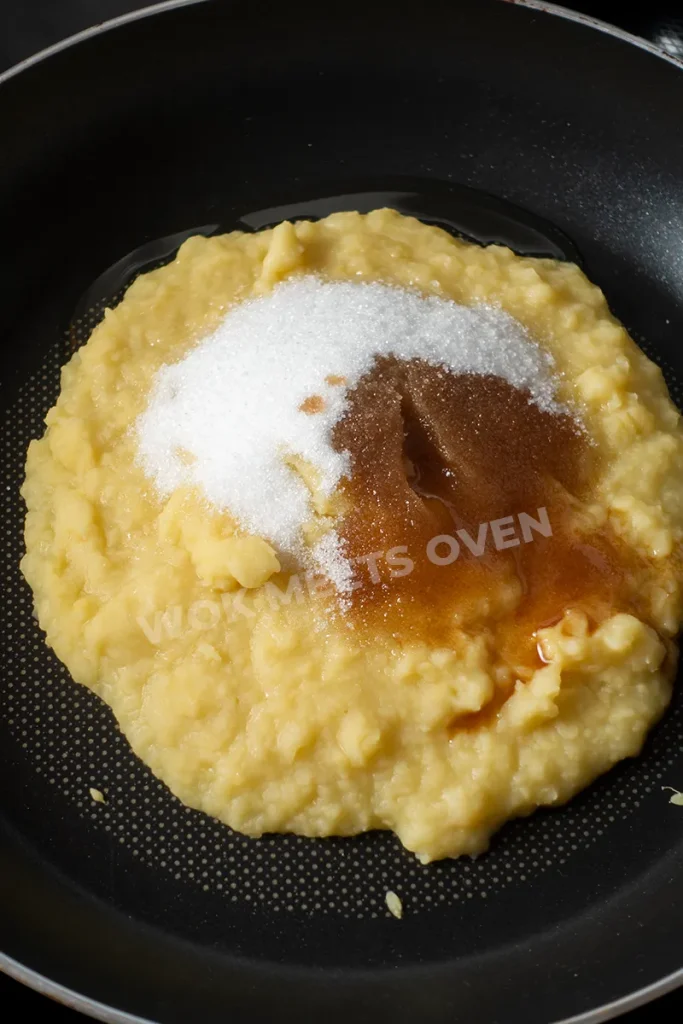Adding in oil, sugar, and vanilla extract to cooked mung beans
