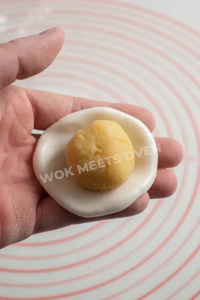 Filling in middle of dough ball