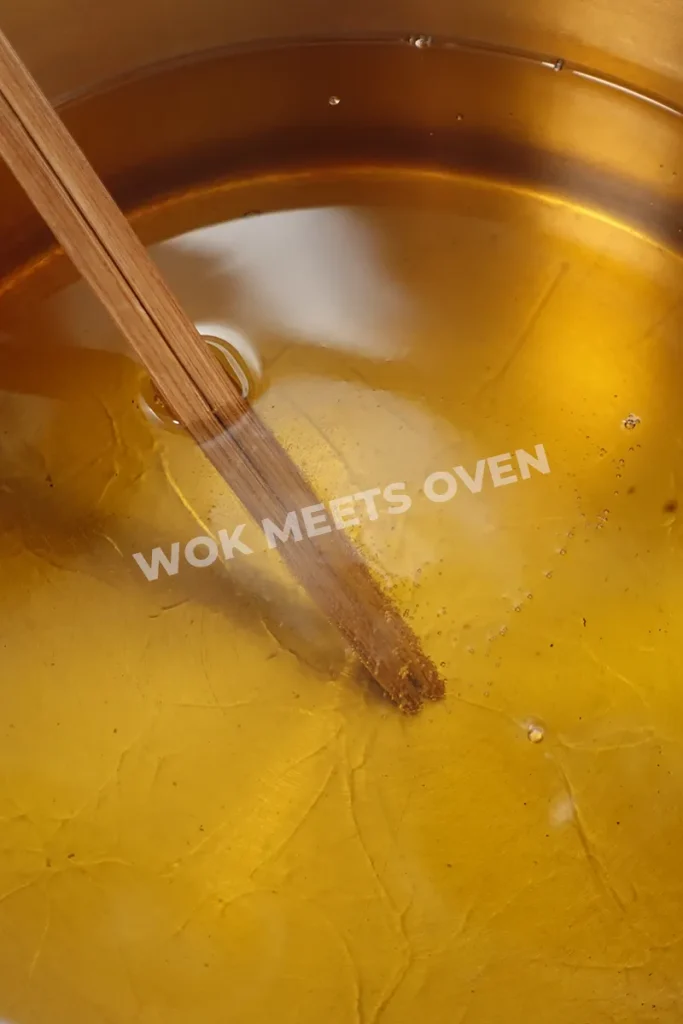 Chopsticks in hot oil