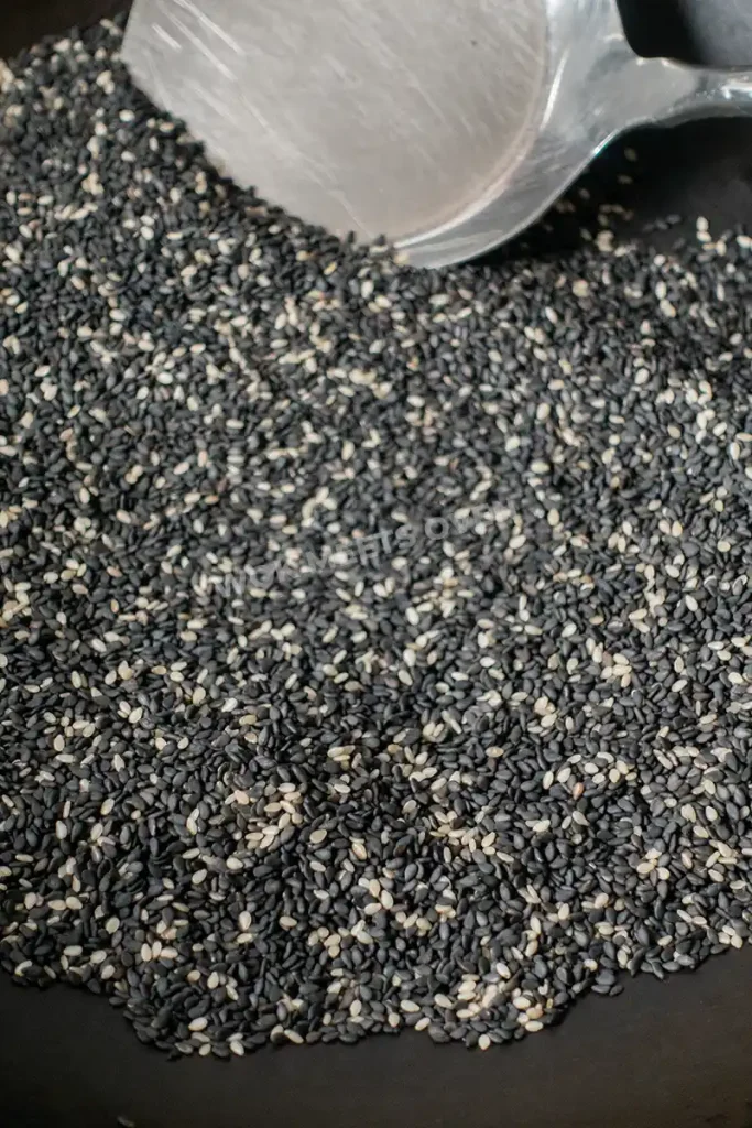 Toasting sesame seeds in wok