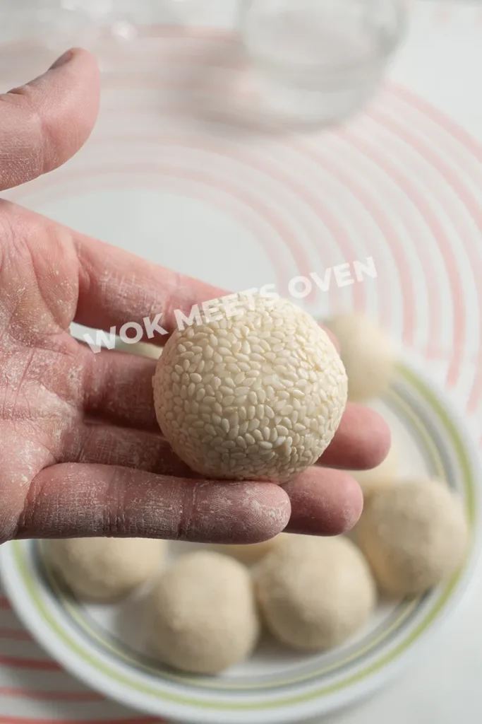 Finished covering dough in sesame seeds