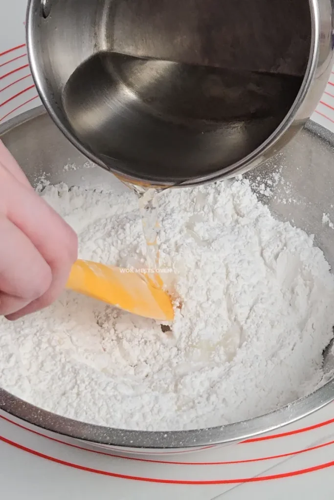Hot water poured into glutinous rice flour and lard
